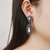 Picture of Delicate Cubic Zirconia Pink Dangle Earrings