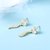 Picture of Delicate Small White Stud Earrings