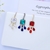 Picture of Copper or Brass Cubic Zirconia Dangle Earrings at Unbeatable Price